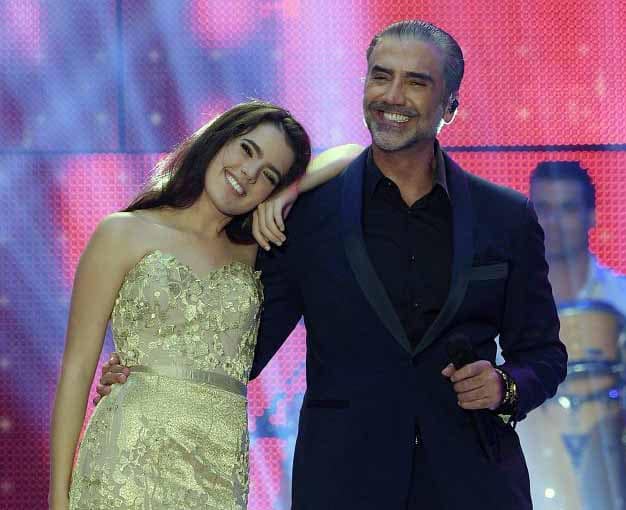 Photo of Alejandro Fernandez and his daughter Camila performing in the concert.