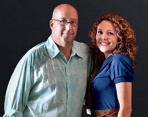 Image of chef, Andrew Zimmern and his wife, Rishia Haas.