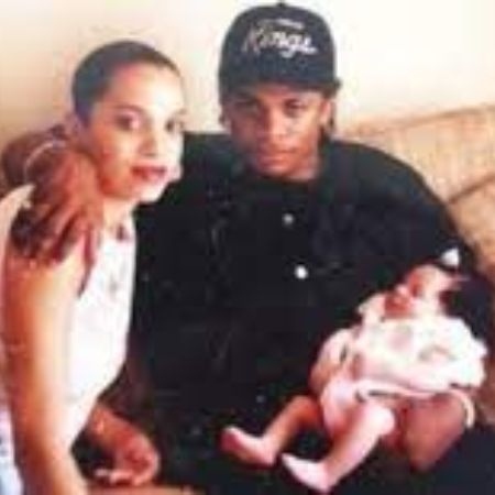 Daijah Wright with her parentgs in childhood days